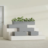 Antwerp Rectangular fiberglass planter in Matte Gunmetal, size range, in a sunlit interior