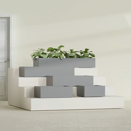 Antwerp Rectangular fiberglass planter in Matte Gunmetal, size range, in a sunlit interior