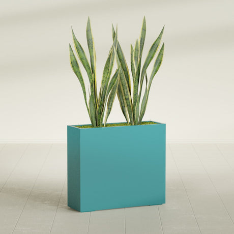 Perth Corner fiberglass planter in Satin Seafoam Green, shown planted, in a sunlit interior