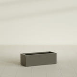 Cuba Low Rectangular Planter in Matte Bronze, 36"L × 14"D × 12"H, shown empty