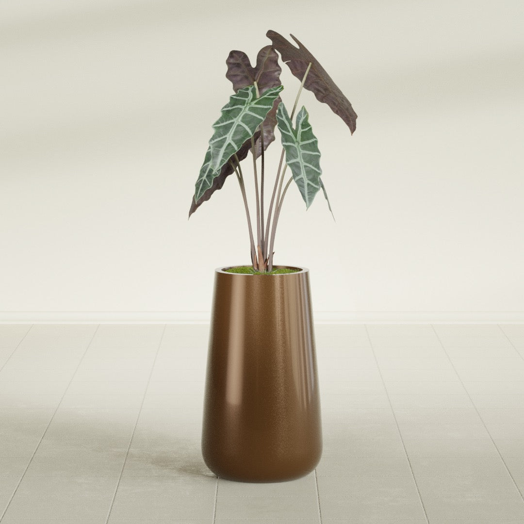 Saigon Tapered Round fiberglass planter in Metallic Bronze, shown planted, in a sunlit interior