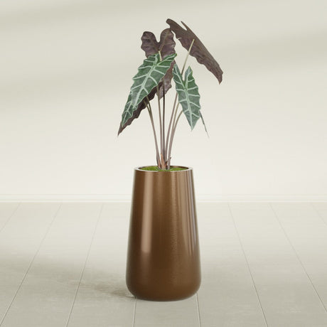 Saigon Tapered Round fiberglass planter in Metallic Bronze, shown planted, in a sunlit interior