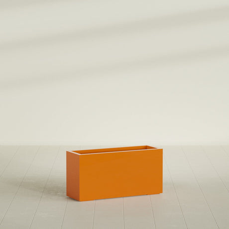 Hollywood Narrow Rectangular Planter in Gloss Tangerine, 36"L × 12"D × 24"H, shown empty
