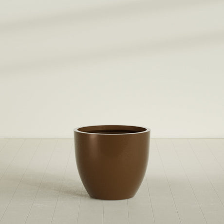 Wannsee Round Planter in Metallic Bronze, 39"D × 34"H, shown empty