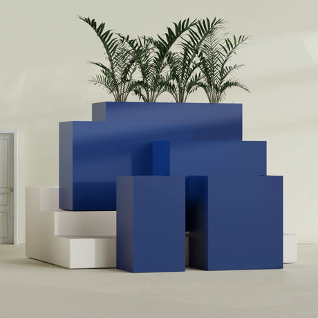Darwin Rectangular fiberglass planter in Matte Cobalt Blue, size range, in a sunlit interior