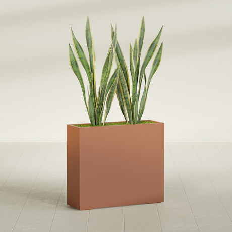 Perth Rectangular fiberglass planter in Matte Terra Cotta, shown planted, in a sunlit interior