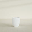 Valencia Tapered Round Planter in Matte Bright White, 15"D × 18"H, shown empty