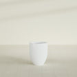 Valencia Tapered Round Planter in Matte Bright White, 15"D × 18"H, shown empty