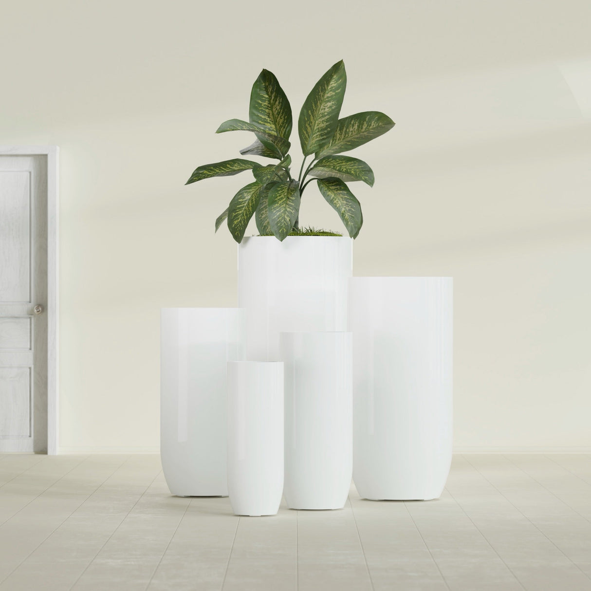 Saint Tropez Bullet Round fiberglass planter in Gloss Bright White, size range, in a sunlit interior