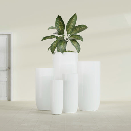 Saint Tropez Bullet Round fiberglass planter in Gloss Bright White, size range, in a sunlit interior