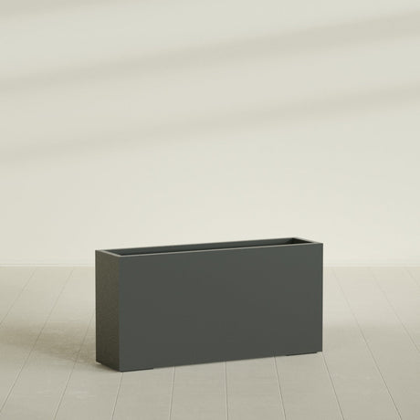 Hollywood Narrow Rectangular Planter in Matte Charcoal, 48"L × 12"D × 24"H, shown empty