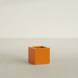 Montroy Cube Planter in Gloss Tangerine, 16", shown empty