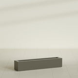 Salon Box Planter in Matte Bronze, 42" Long, shown empty