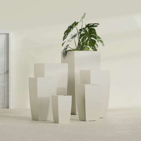 Toulan Tapered Square fiberglass planter in Satin Beige, size range, in a sunlit interior
