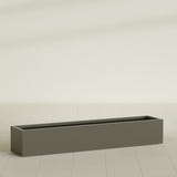 Cuba Low Rectangular Planter in Matte Bronze, 72"L × 14"D × 12"H, shown empty