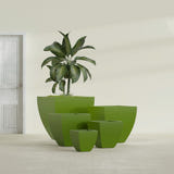 Lima Tapered Square fiberglass planter in Satin Green, size range, in a sunlit interior