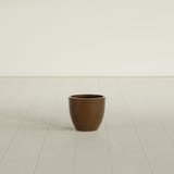 Wannsee Round Planter in Metallic Bronze, 15"D × 13"H, shown empty