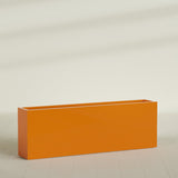 Hollywood Narrow Rectangular Planter in Gloss Tangerine, 72"L × 12"D × 24"H, shown empty