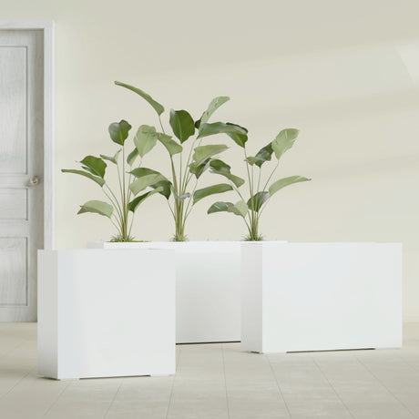 Milano Narrow Rectangular fiberglass planter in Gloss Bright White, shown planted, in a sunlit interior