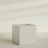 Montroy Cube Planter in Satin Beige, 60", shown empty