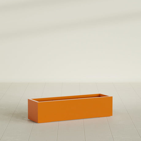 Cuba Low Rectangular Planter in Gloss Tangerine, 48"L × 14"D × 12"H, shown empty
