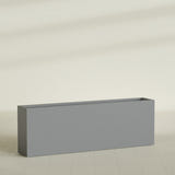 Hollywood Narrow Rectangular Planter in Matte Gunmetal, 72"L × 12"D × 24"H, shown empty
