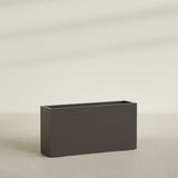 Hollywood Narrow Rectangular Planter in Matte Dark Brown, 48"L × 12"D × 24"H, shown empty