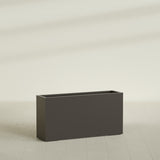 Hollywood Narrow Rectangular Planter in Matte Dark Brown, 48"L × 12"D × 24"H, shown empty