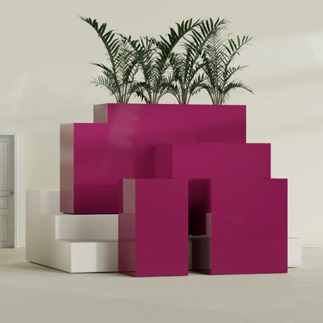Darwin Corner fiberglass planter in Gloss Eggplant, size range, in a sunlit interior