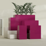 Darwin Rectangular fiberglass planter in Gloss Eggplant, size range, in a sunlit interior