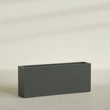 Hollywood Narrow Rectangular Planter in Matte Charcoal, 60"L × 12"D × 24"H, shown empty