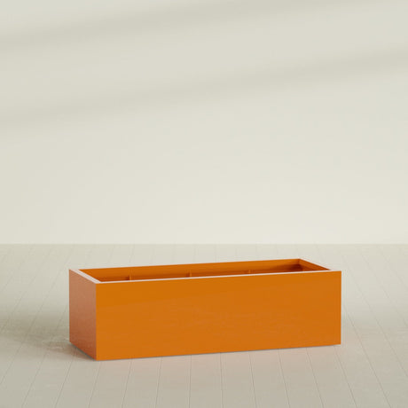 Torino Wide Rectangular Planter in Gloss Tangerine, 60"L × 24"D × 18"H, shown empty