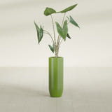 Saint Tropez Bullet Round fiberglass planter in Satin Green, shown planted, in a sunlit interior