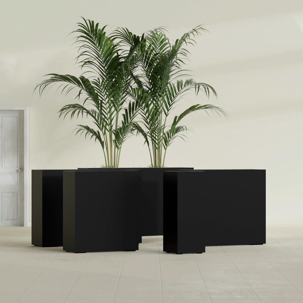 Perth Corner fiberglass planter in Matte Black, size range, in a sunlit interior