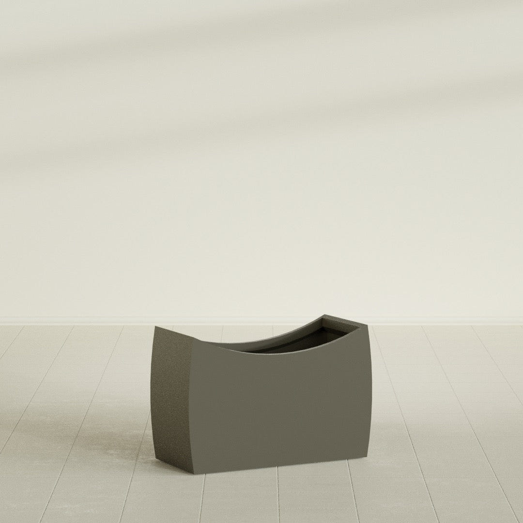Seoul Curved Planter in Matte Bronze, 36"L × 16"D × 24"H, shown empty