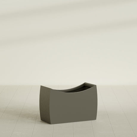 Seoul Curved Planter in Matte Bronze, 36"L × 16"D × 24"H, shown empty