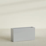 Potsdam Rectangular Planter in Metallic Silver, 60"L × 16"D × 32"H, shown empty