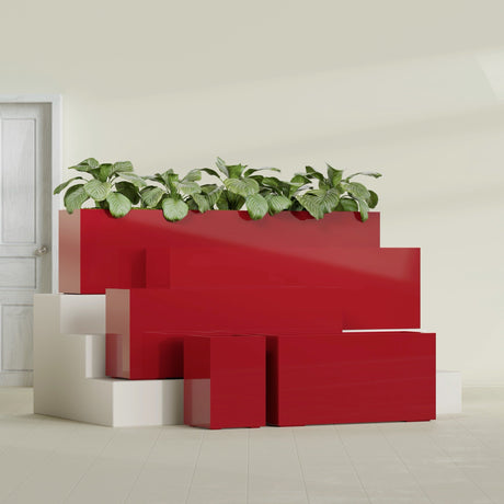 Miami Corner fiberglass planter in Gloss Red, size range, in a sunlit interior