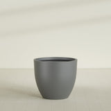 Wannsee Round Planter in Matte Gunmetal, 44"D × 39"H, shown empty