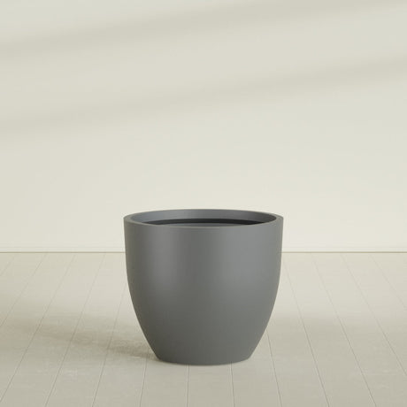 Wannsee Round Planter in Matte Gunmetal, 44"D × 39"H, shown empty
