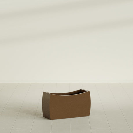 Seoul Curved Planter in Metallic Bronze, 32"L × 12"D × 18"H, shown empty