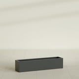 Monaco Rectangle Planter in Matte Charcoal, 32"L, shown empty
