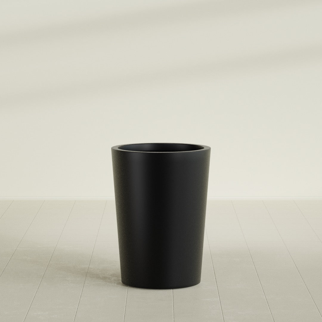 Tegel Round Tapered Planter in Matte Black, 22"D × 30"H, shown empty