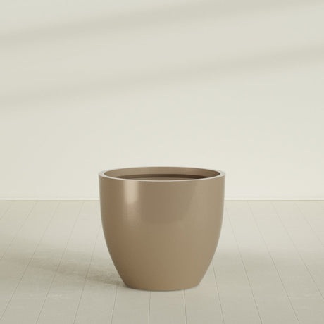 Wannsee Round Planter in Gloss Metallic Gold, 44"D × 39"H, shown empty
