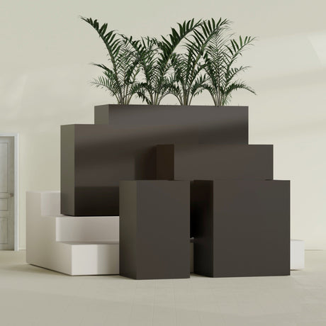 Darwin Rectangular fiberglass planter in Matte Dark Brown, size range, in a sunlit interior