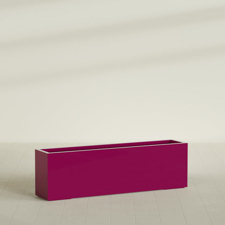 Miami Narrow Rectangular Planter in Gloss Eggplant, 60"L × 12"D × 18"H, shown empty