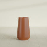 Saigon Tapered Round Planter in Matte Terra Cotta, 16"D × 36"H, shown empty