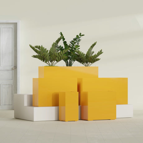 Potsdam Corner fiberglass planter in Gloss Saffron, size range, in a sunlit interior