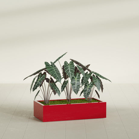 Antwerp Corner fiberglass planter in Gloss Red, shown planted, in a sunlit interior