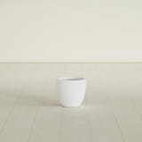 Wannsee Round Planter in Matte Bright White, 15"D × 13"H, shown empty